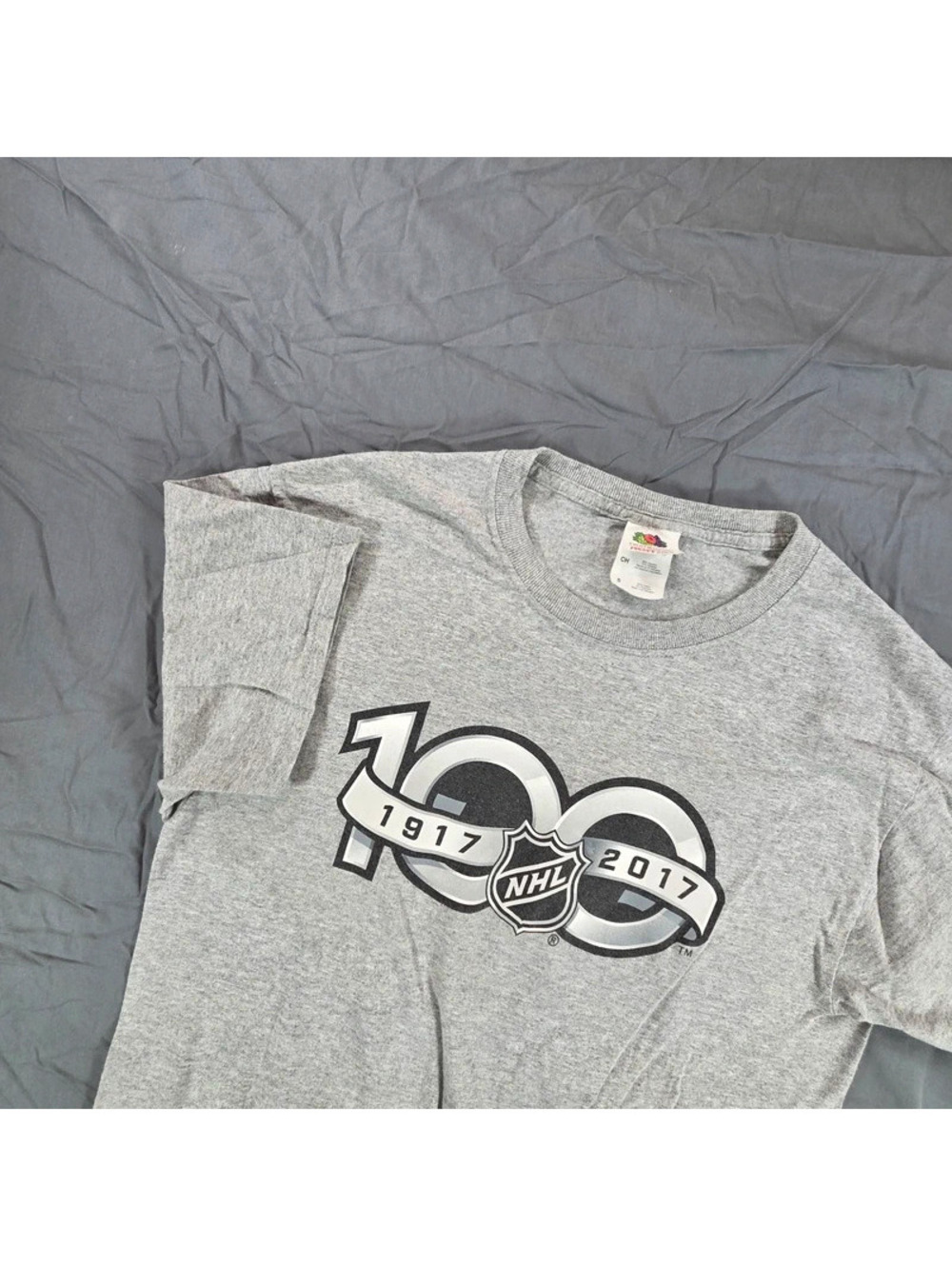 short-sleeve T-shirt featuring the official National Hockey League (NHL